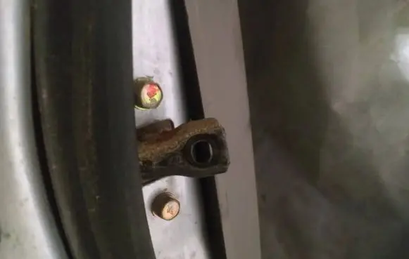 Rear door check strap stopper