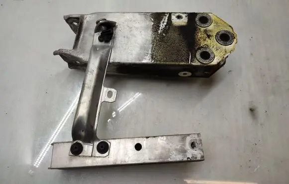 Radiator support slam panel bracket