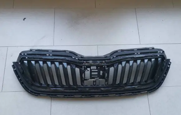 Skoda Scala Front bumper upper radiator grill 657853653