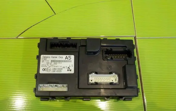 Nissan Juke I F15 Central body control module 284B11KB1D 8AB31