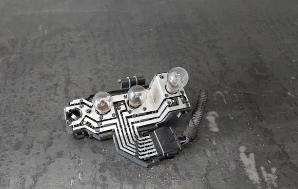 Tail light bulb cover holder