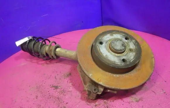 Front wheel hub spindle knuckle