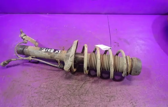 Volkswagen Golf IV Front shock absorber with coil spring