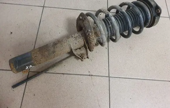 Skoda Octavia Mk2 (1Z) Front shock absorber with coil spring