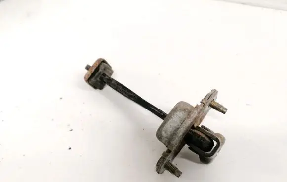 Subaru Impreza II Rear door check strap stopper