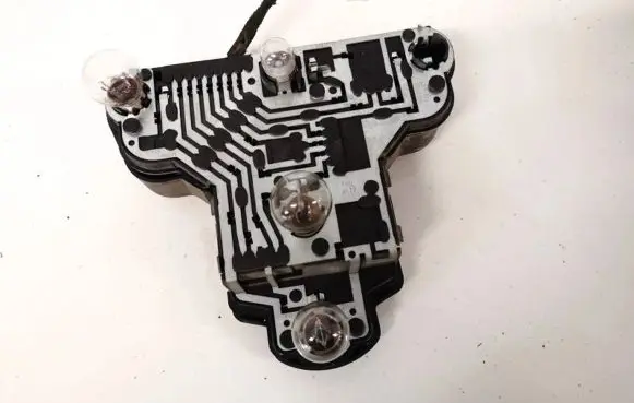 Tail light bulb cover holder