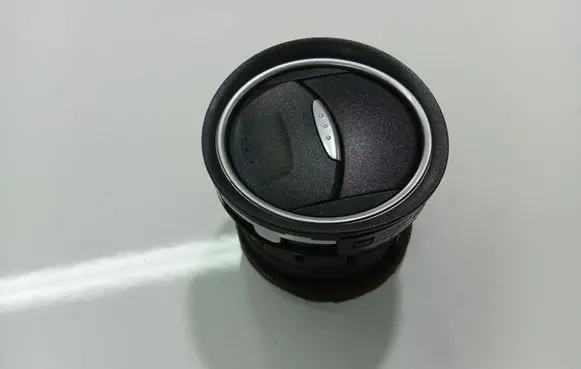 Dash center air vent grill