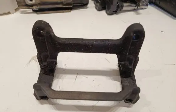 Audi A6 S6 C8 4K Brake caliper pad carrier rear 2326C