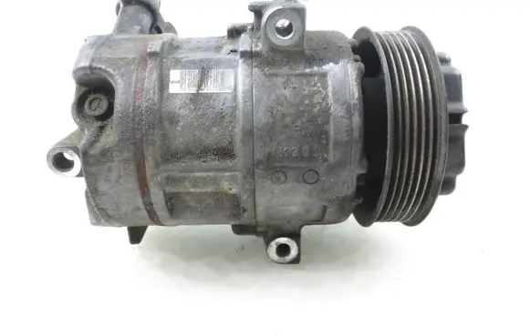 Opel Corsa D Air conditioning (A/C) compressor (pump) 55703721