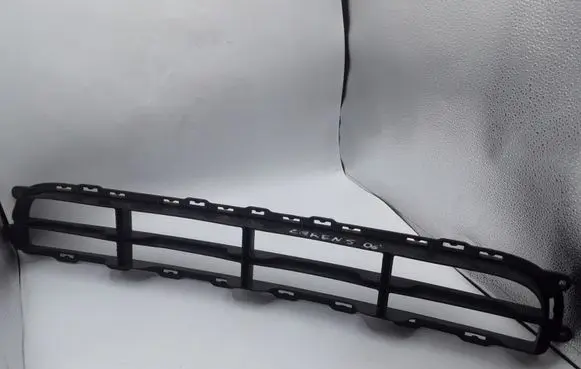 KIA Carens I Front bumper lower grill 865611D050