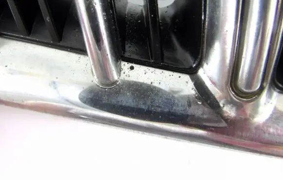 KIA Carens I Front grill 0K2C350710