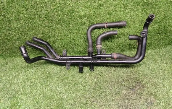 Volkswagen Jetta VI Engine coolant pipe/hose 04E121070J