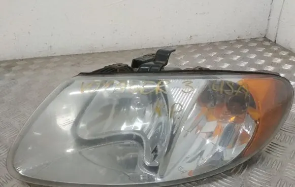 Chrysler Voyager Headlight/headlamp 04857701AB