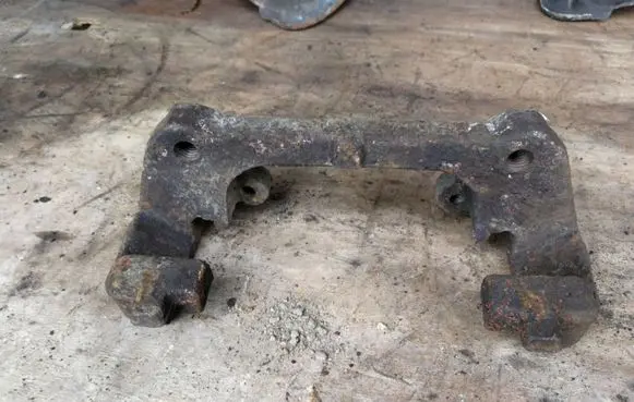 Volvo V70 Front Brake Caliper Pad/Carrier 