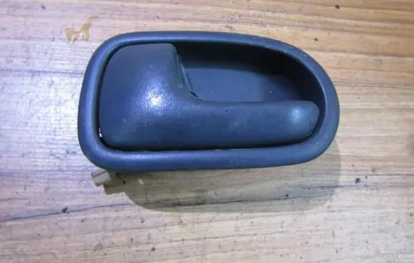 Mazda 323 Rear door interior handle