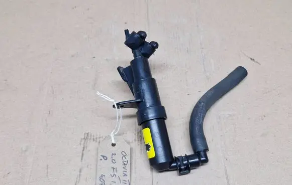 Skoda Octavia Mk2 (1Z) Headlight washer spray nozzle 1300390111
