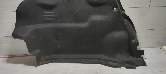 Trunk/boot lower side trim panel