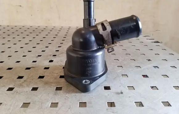 Thermostat/thermostat housing