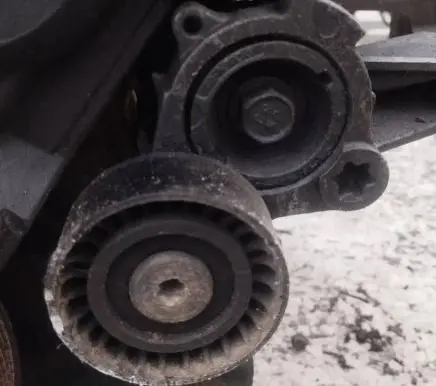 Generator/alternator belt tensioner