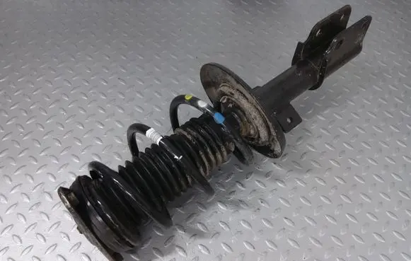 Peugeot Partner III Front shock absorber with coil spring 9833305980