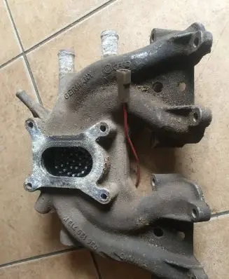 Volkswagen Golf II Intake manifold 036129713k