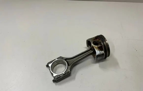Piston with connecting rod