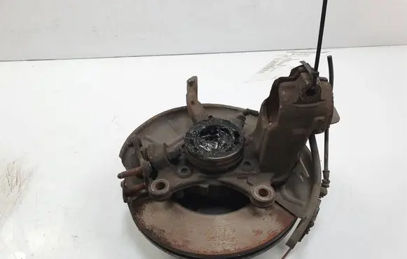 Volkswagen Touran I Front wheel hub spindle knuckle