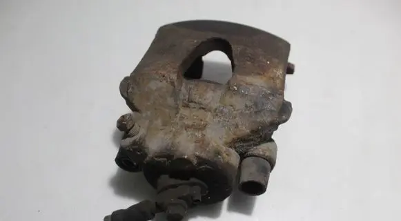 Volkswagen Golf VI Front brake caliper