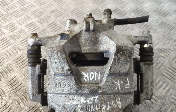 Opel Astra J Front brake caliper 