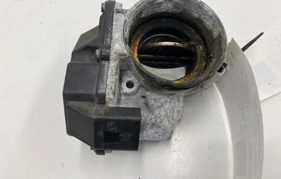 Volkswagen Touran I Throttle valve 03G128063A
