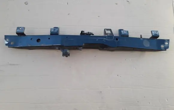 Top upper radiator support slam panel