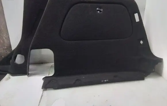 Trunk/boot lower side trim panel