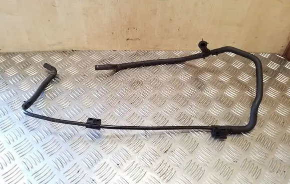 Volkswagen Golf IV Engine coolant pipe/hose 1J0122447CE