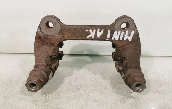 Mini One - Cooper Coupe R56 Brake caliper pad carrier rear 