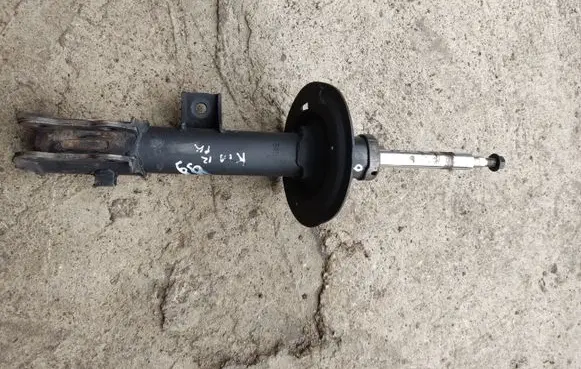 KIA Sportage Front shock absorber/damper 546513U000