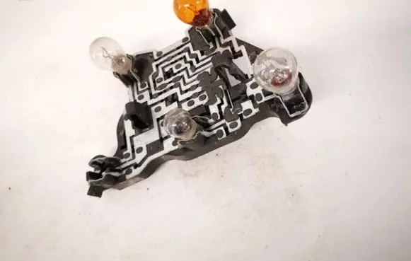 BMW 3 E36 Tail light bulb cover holder
