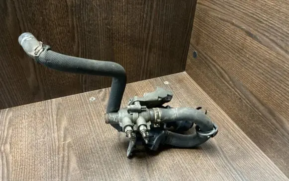 Thermostat/thermostat housing