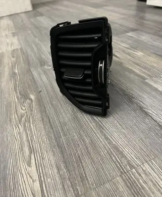 KIA Sportage Dash center air vent grill 97410F1000