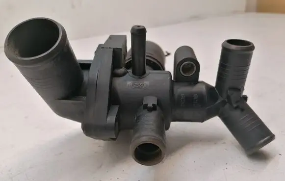 Thermostat/thermostat housing