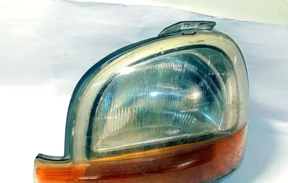 Renault Kangoo I Headlight/headlamp 7701044037