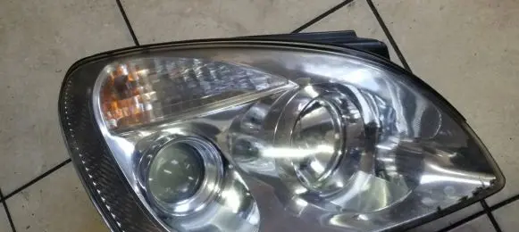 KIA Carens III Headlight/headlamp 921021D0