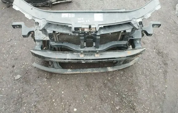 Radiator support slam panel