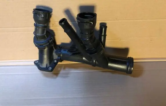 Thermostat/thermostat housing