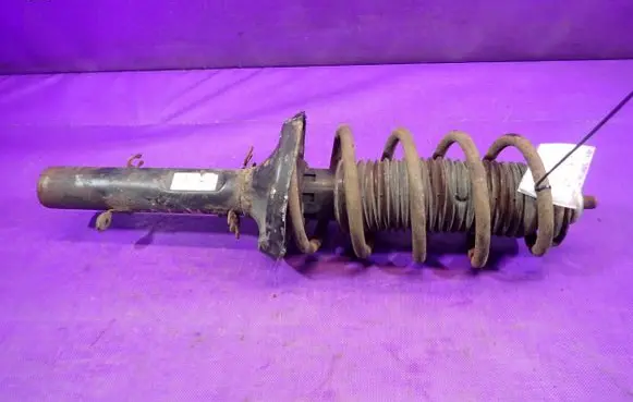 Volkswagen Golf IV Front shock absorber with coil spring 824903556499