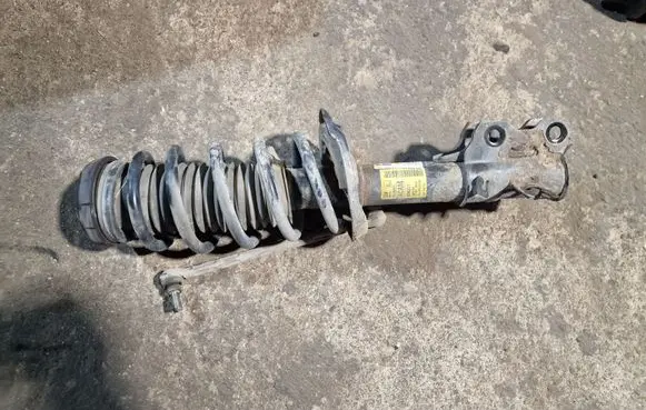 Buick Encore I Front shock absorber with coil spring AFYL78886CN 47733209