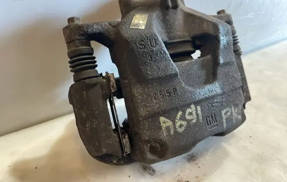 Opel Astra J Front brake caliper 6003