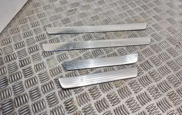 Mercedes-Benz ML W166 sill trim set (inner) A1666861936