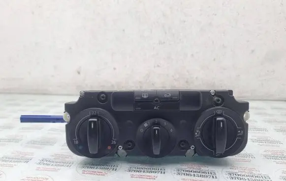 Volkswagen Touran I Climate control unit 