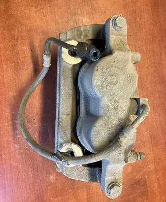 Ram 1500 Front brake caliper A002U888