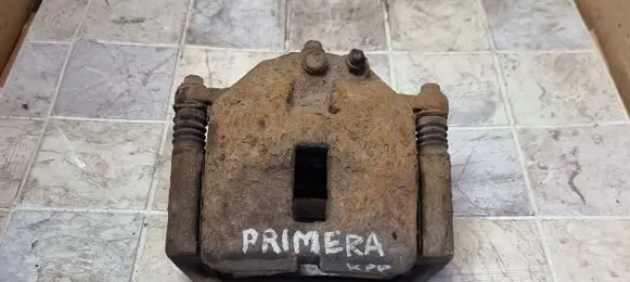 Nissan Primera Front brake caliper